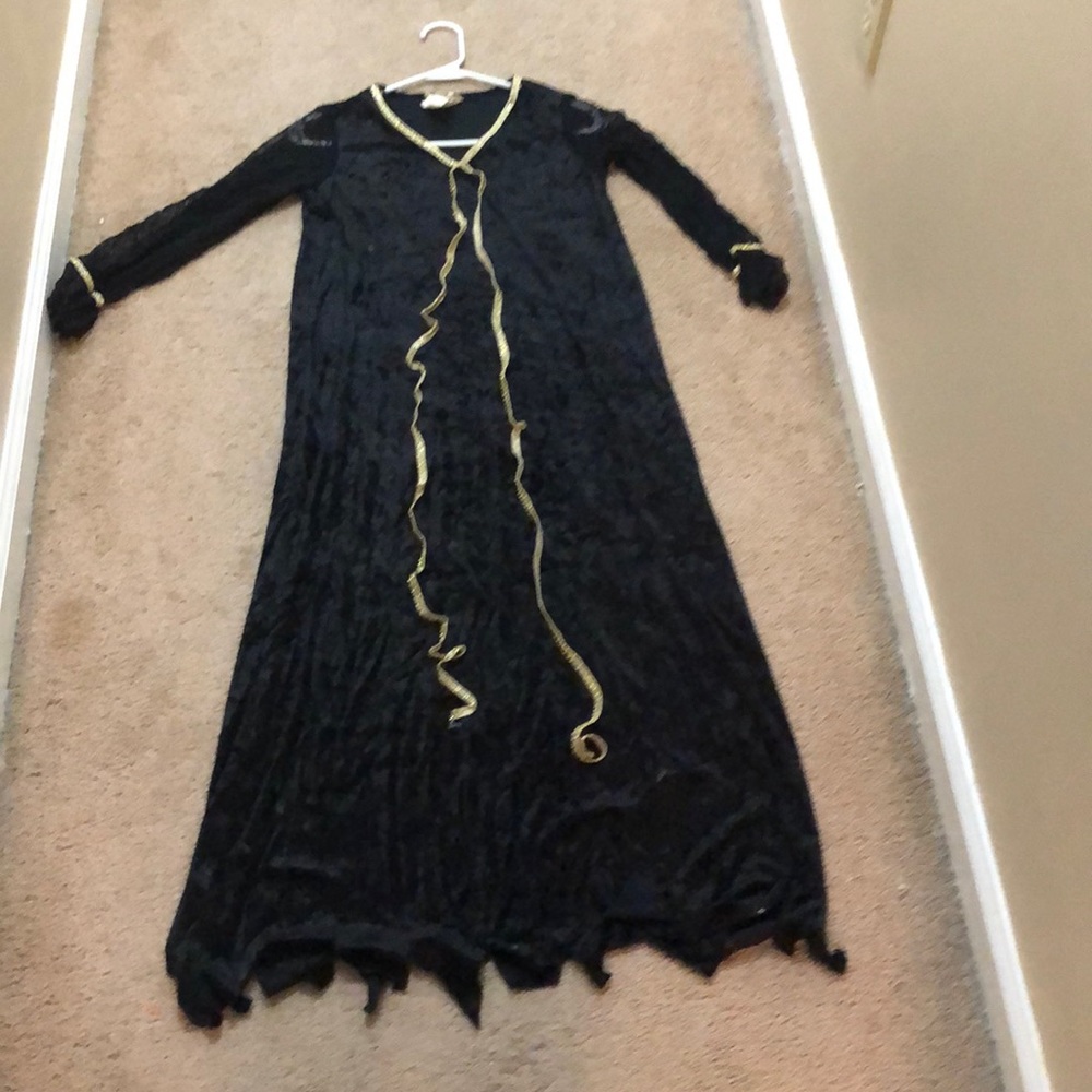 Black with gold trim and lace sleeves child’s medium Halloween costume